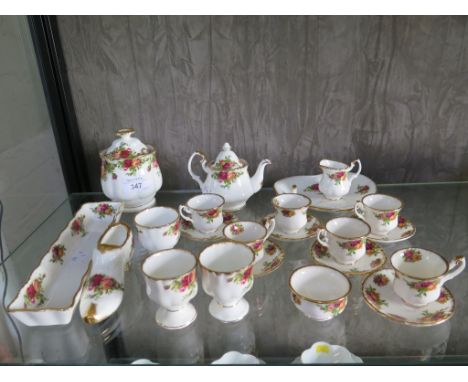 Royal Albert Old Country Roses miniature tea service, with teapot and six cups and saucers, three egg cups, marmalade pot and