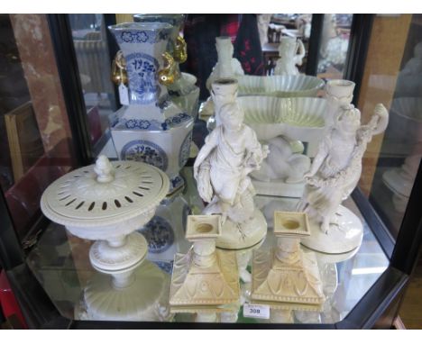 A pair of Royal Worcester candlesticks of square form with medallions and swags, 11cm high, one chipped, a Copeland Parian po