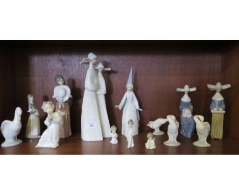 Thirteen Lladro figures, including a female wizard, nuns and geese, and a Nao figure of a goose (14)