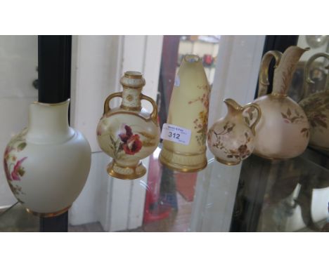 Two blush ivory Royal Worcester jugs, with floral decoration, 16cm and 12cm high, a two handled poppy vase, 13cm high and two