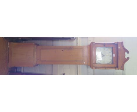 An early 19th century pine longcase clock, with swanneck pediment, the painted dial with floral spandrels, date aperture and 