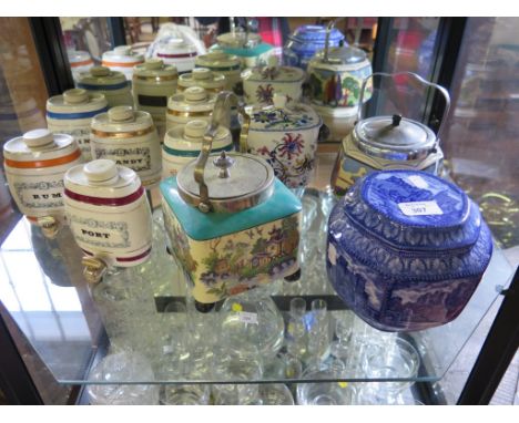 A Maling for Ringtons tea caddy, blue and white depicting castles, Wade barrels, two biscuit barrels and various jugs