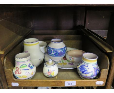 Four Poole pottery vases, two with impressed mark, two dishes, a jam pot and a plate