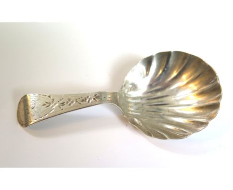 A George III silver caddy spoon with shell bowl