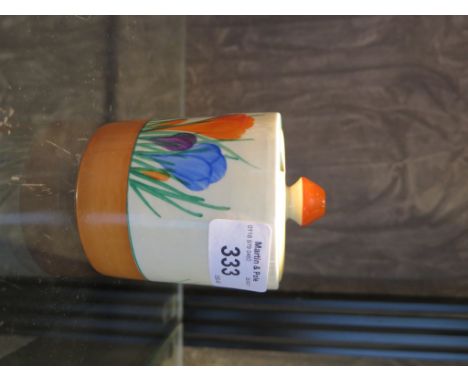 A Clarice Cliff for Newport pottery crocus pattern jam pot and cover, 9cm high