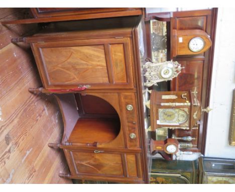 An Edwardian mahogany and satinwood crossbanded sideboard, the raised back with mirror panel and shelf over a central drawer 