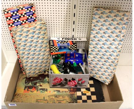 A vintage Scalextric set and accessories.