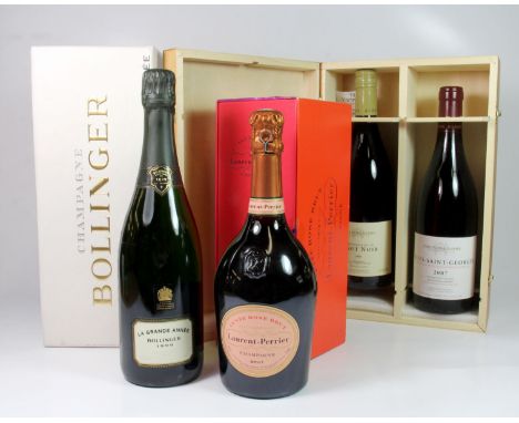 A boxed bottle of Bollinger Champagne 1999, a boxed Laurent Perrier and two bottles of vintage Fortnum and Mason wine.