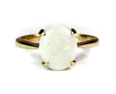 A 9ct yellow gold ring set with a cabochon cut opal (opal size 10 x 8mm) (K).