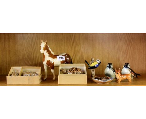 A Beswick pony, Doulton Corgi and three Goebel bird figures, plus three Wade items.