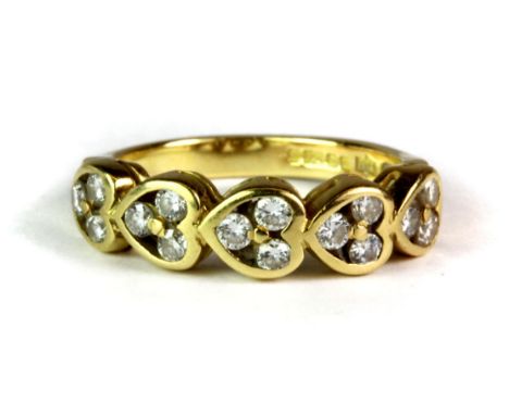 An 18ct yellow gold diamond set heart ring (approx 0.75ct diamonds total) (K).