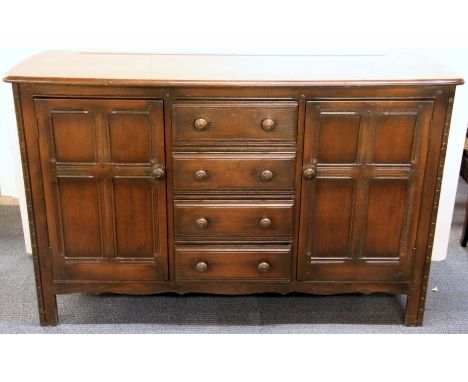 A vintage oak sideboard, W. 146, H. 90cm.