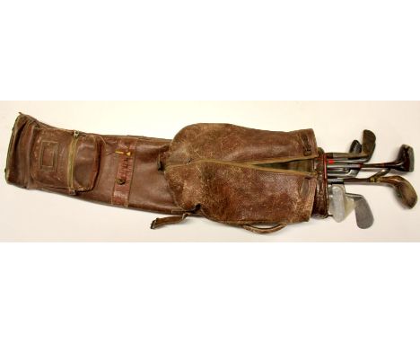 A set of vintage golf clubs.