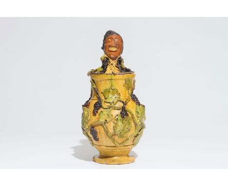 An exceptional Flemish pottery figurative tobacco jar, attr. to Leo Maes, 2nd half 19th C. H.: 34,5 cm (incl. lid) Published 