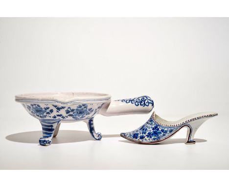 A Dutch Delft blue and white model of a slipper and a chafing dish, 18th C. H.: 10,5 cm - L.: 30,5 cm - W.: 21 cm (the chafin