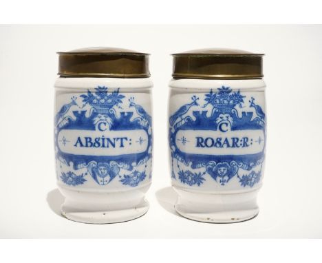 A pair of Dutch Delft blue and white albarello pharmacy jars with brass covers, 18th C. H.: 18,5 cm - Dia.: 11 cm We have mor
