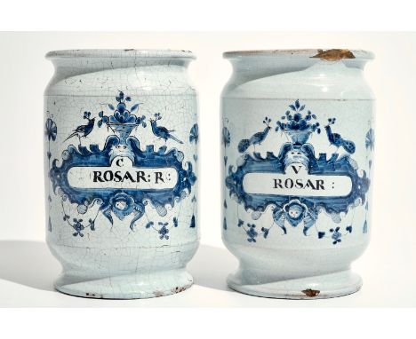 A pair of Brussels faience albarello drug jars, 18th C. H.: 17 cm - Dia.: 11 cm We have more lots available for bidding on on