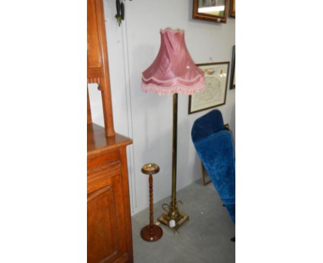 A brass standard lamp with shade and smokers stand