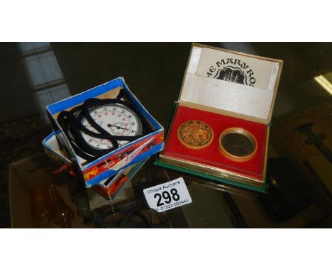 A boxed Smiths stop watch and a boxed Mary Rose compass