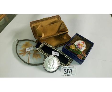A Royal Worcester brooch, a Scottish thistle brooch and other interesting items