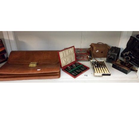 A quantity of miscellaneous items including briefcase & boxed Brownie camera etc.