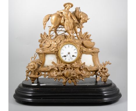 19th Century French gilt spelter mantel clock, case surmounted with a figure and a horse, circular enamel dial with Roman num