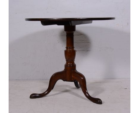 George IV mahogany pedestal table, circular tilt top, turned baluster column, tripod legs, diameter 84cm.