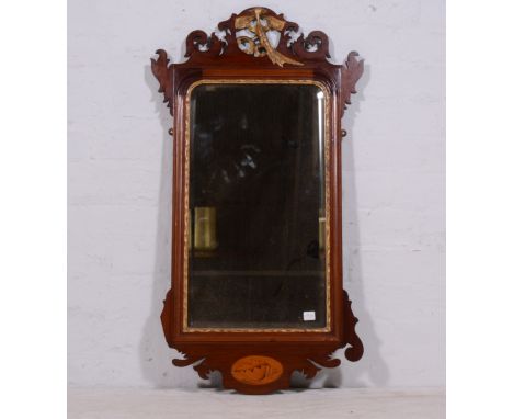Victorian mahogany pier glass, in the Chippendale style, the pediment carved and gilt with a bird, fretted frame, bevelled re