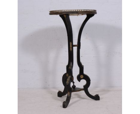 Continental marquetry ebonised and gilt metal mounted centre table, the table top with a ceramic plate insert, (substantial d