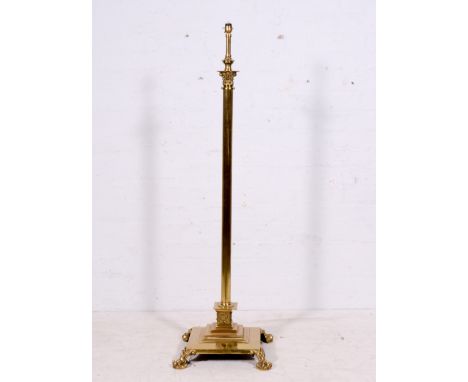 Brass Corinthian column standard lamp, fluted shaft, claw feet, height 128cm.