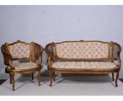 French three-piece gilt painted suite, comprising a pair of fauteuil and matching canape buttoned brocade patterned upholster