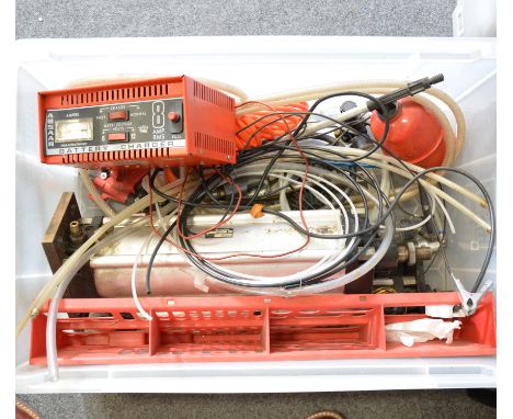 Two boxes of electrical equipment and tools.
