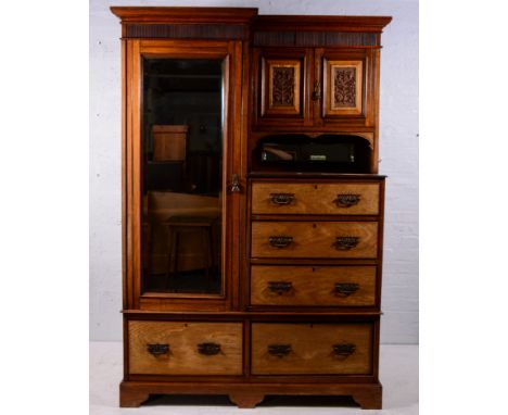 Late Victorian walnut bedroom suite, comprising combination wardrobe, moulded cornice above a reeded frieze, mirrored door, d