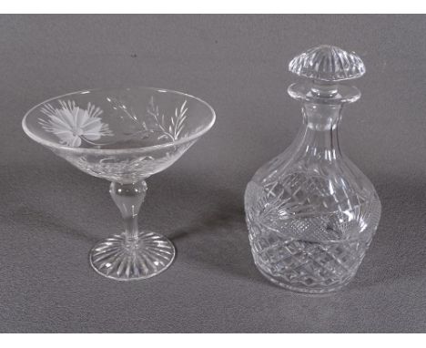 GLASSWARE - a fine hobnail cut stoppered whiskey decanter and a cut and etched pedestal dish