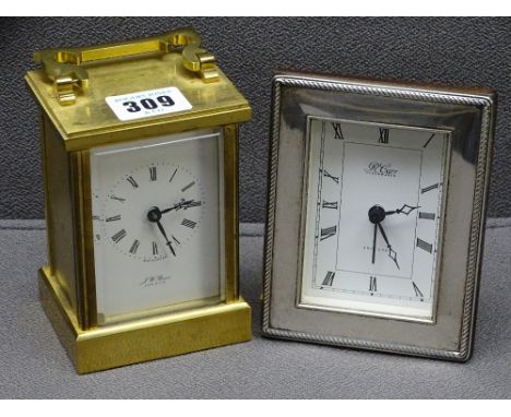 SILVER FRAMED R CARR CLOCK together with heavy brass cased carriage clock by J W Benson London