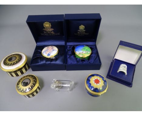 FIVE ROYAL WORCESTER PORCELAIN PILL BOXES including Millennium and Celebration 2001, a boxed thimble and novelty glass pig wi