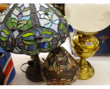 TIFFANY STYLE LAMPS (2) and a brass based oil lamp