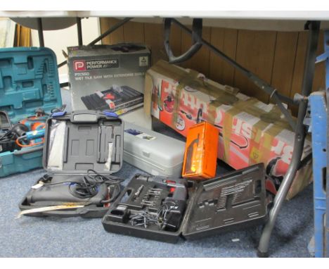 CASED POWER &amp; BENCH TOOLS, a quantity with a boxed petrol brushcutter and a folding workbench, E/T
