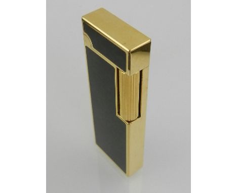 A Dunhill gilt metal and enamelled lighter. 