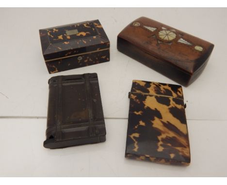 A Victorian rectangular tortoiseshell trinket box, 7.5cm, together with a tortoiseshell card case, an inlaid hardwood table s