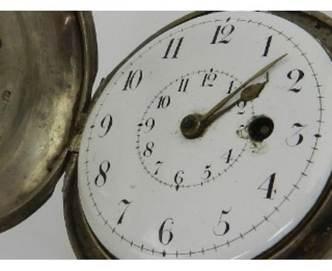 A white metal cased hunter pocket watch, having Arabic enamel dial. 