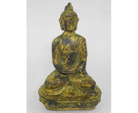 A Chinese gilt bronze figure of a seated Buddha. H: 13cm