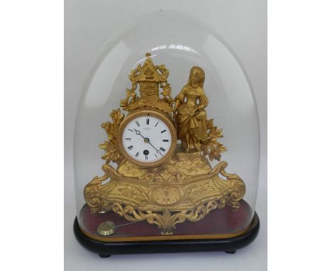 An early 20th century French gilt metal mantel timepiece, the enamel dial with Roman numerals signed Hry Marc, Paris, drum mo