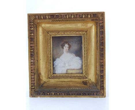 An early 19th century portrait miniature of an elegant lady, wearing a voluminous white dress 12 x 9cm.