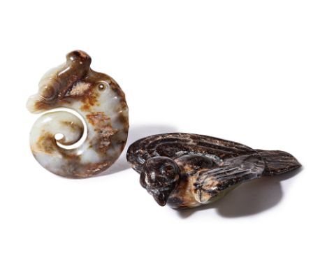 TWO LARGE ARCHAISTIC JADE CARVINGS
One modelled as a bird, with it's head turned; the other a pig dragon pendant with ribbed 