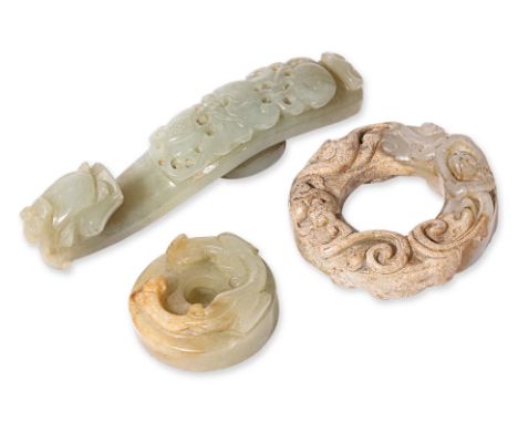 TWO JADE CHILONG DISCS AND A BELT HOOK The larger disc carved to both sides with two trailing chilong; the smaller with a sin