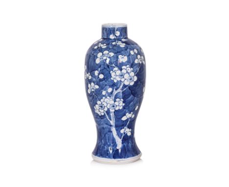 A BLUE AND WHITE PORCELAIN PRUNUS VASE
19th Century, baluster shape decorated with flowering prunus over a blue ground, apocr