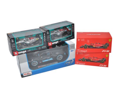 Four boxed Formula One Racing Cars from Burago plus a Maisto 1/24 Bugatti issue. Excellent in boxes. 