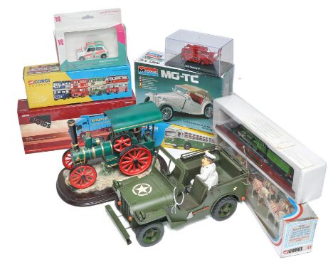 An assortment of general diecast and other models plus plastic model kit. Including Tinplate army jeep, ceramic steam engine,