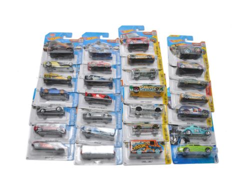 A group of 28 carded Mattel Hot Wheels diecast issues including mostly Showroom and Art Cars Series. 